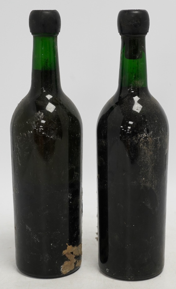 Two bottles of Cockburn's 1967 vintage port. Condition - levels good, capsules sound and labels worn.
